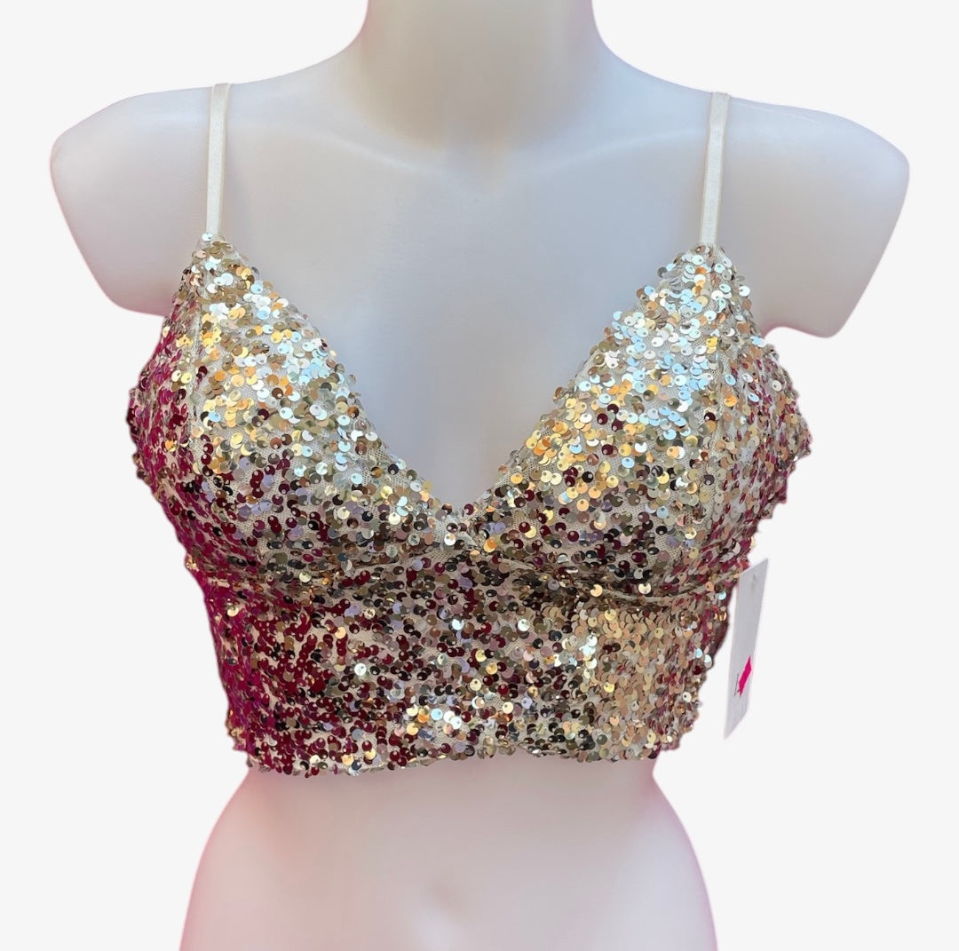 Top ricoperto di paillettes
