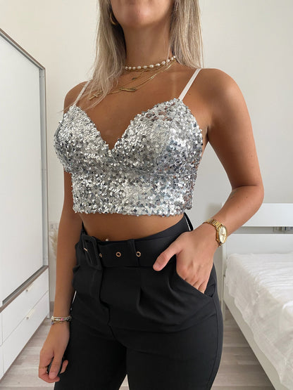 Top ricoperto di paillettes